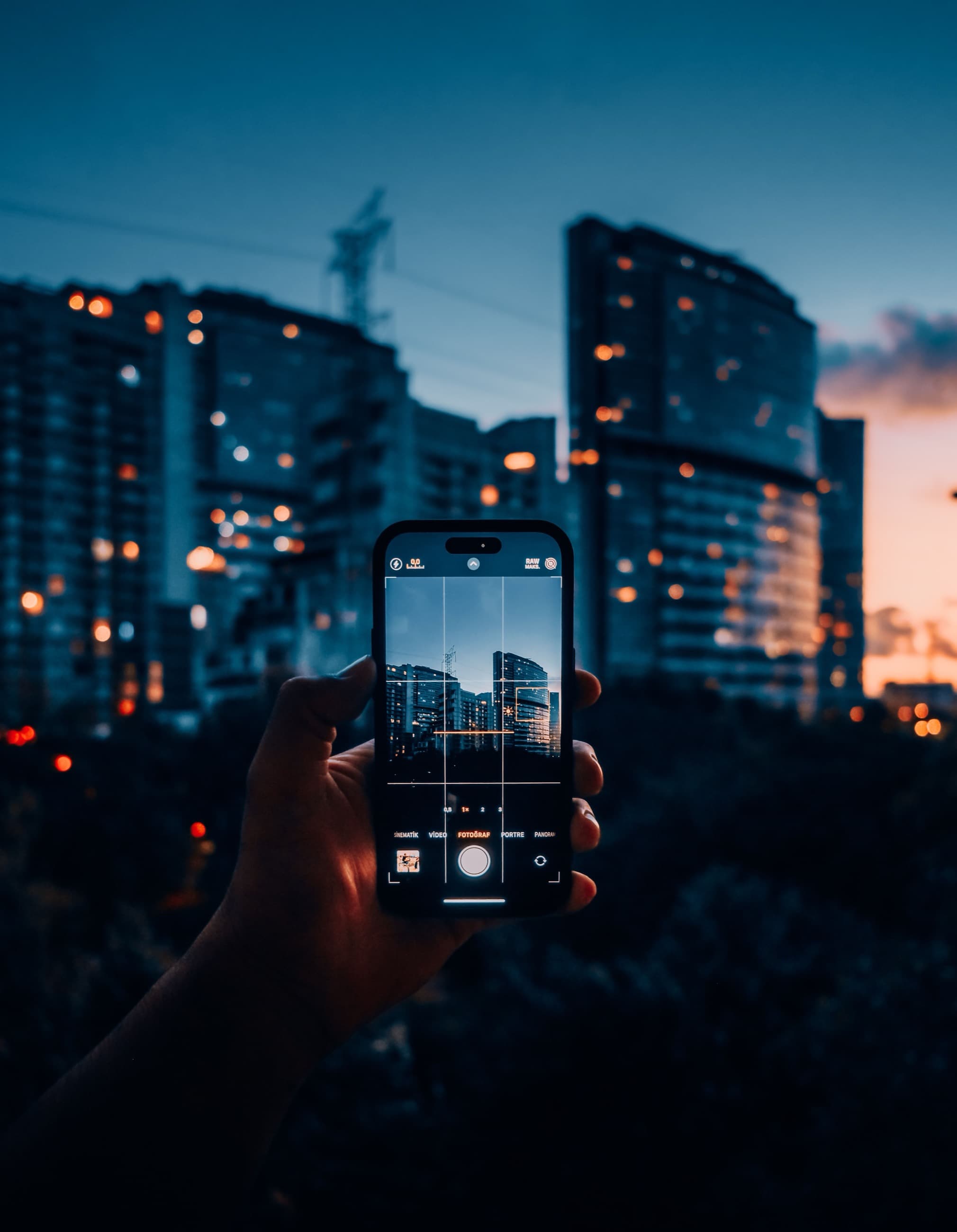 Photographing a city skyline at dusk