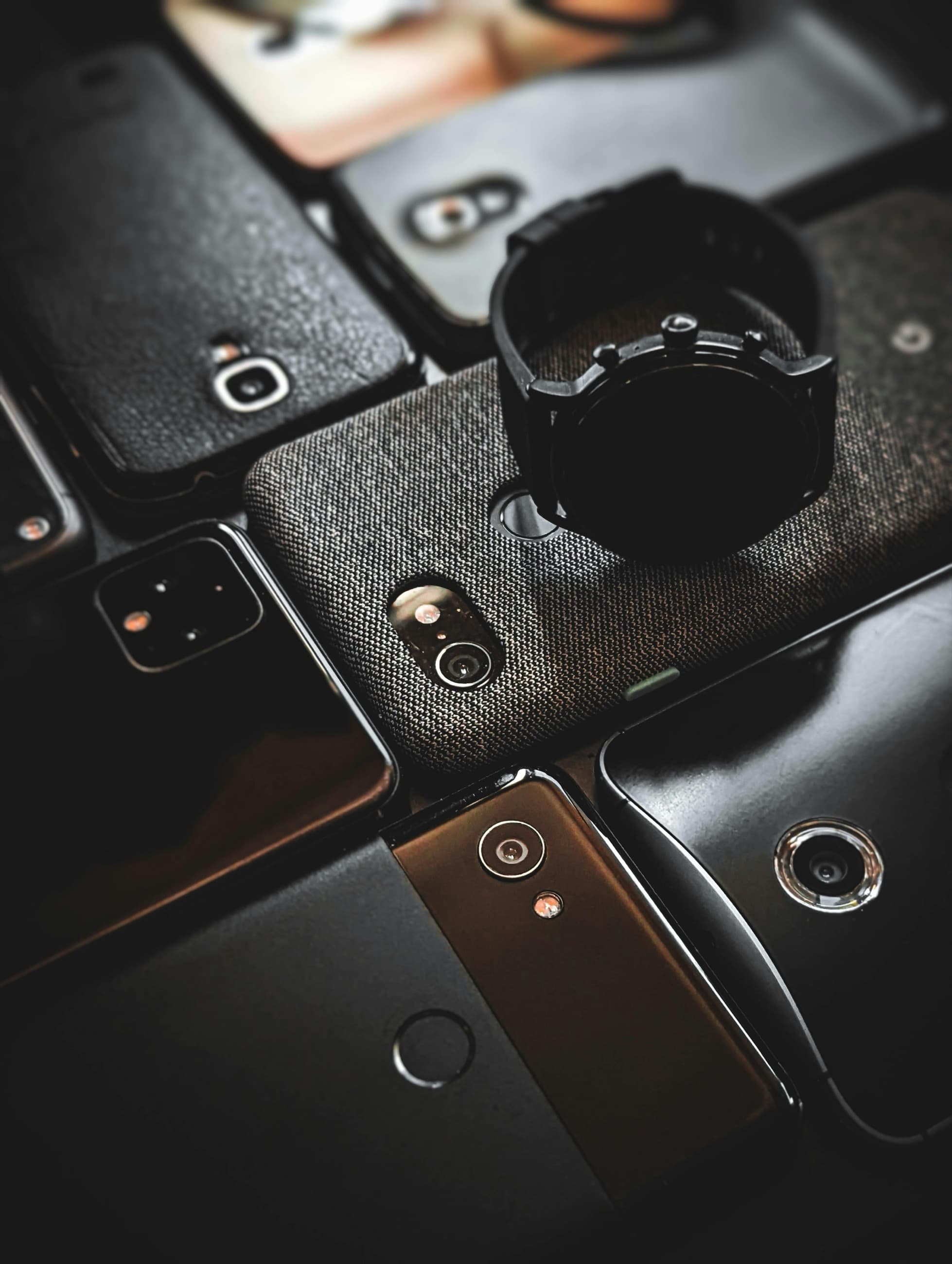 A stack of premium smartphones
